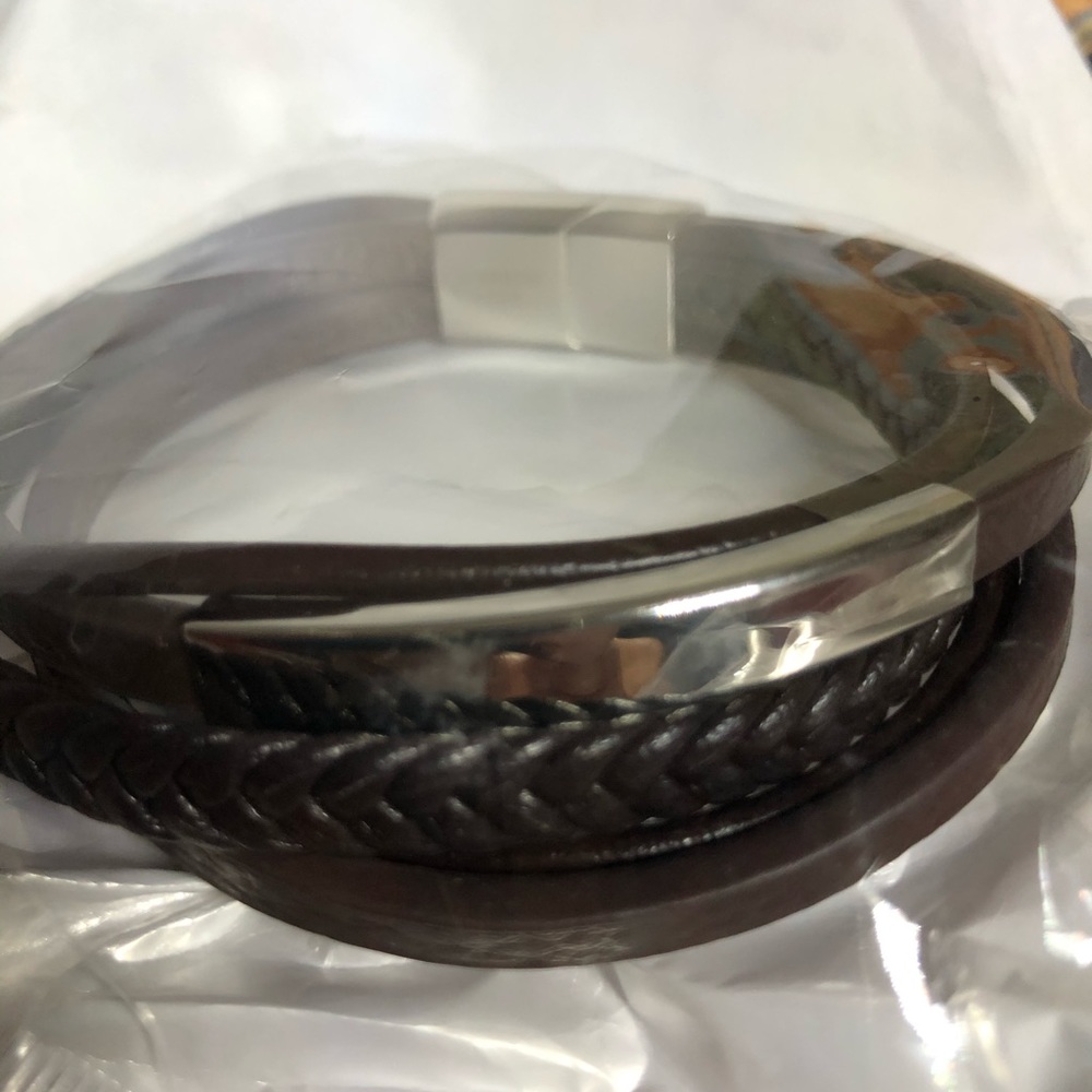 Brown and stainless steel bracelet.